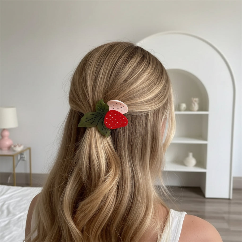 blonde hair lady with pink and ed acetate strawberry claw clip
