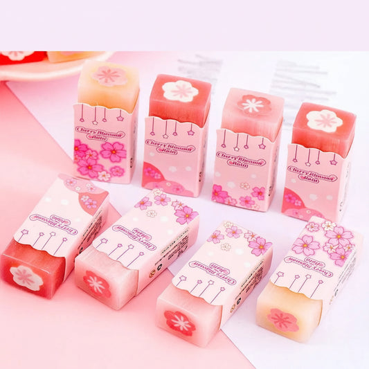 Cherry Blossom Sandwich Erasers with packaging on a pink background